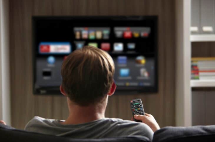 a person watching tv