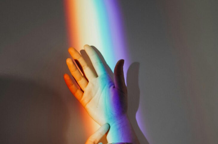 Rainbow light on hand