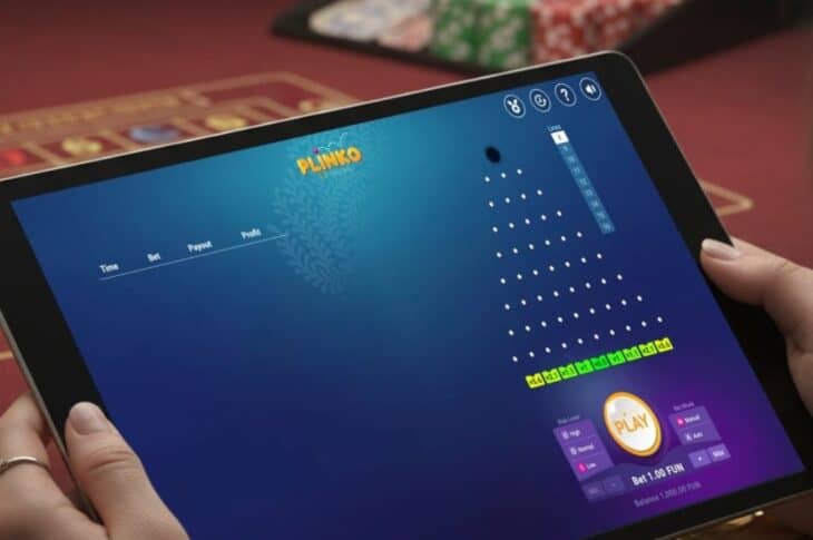 Person playing online Plinko