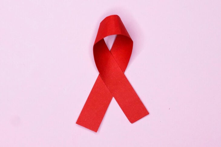 Red ribbon on pink background